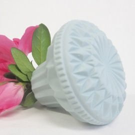 Faceted Daisy vase in pale blue by contemporary Dutch ceramic artist Lenneke Wispelwey
