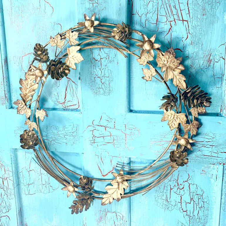 Contemporary brass door wreath