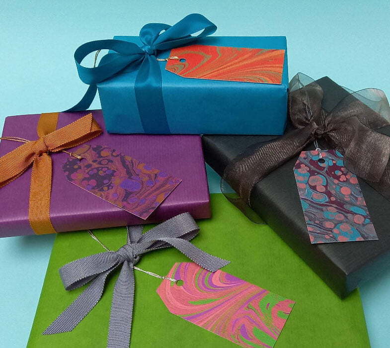 Colourful gifts with contemporary marbled gift tags by Aqua Handmade Books