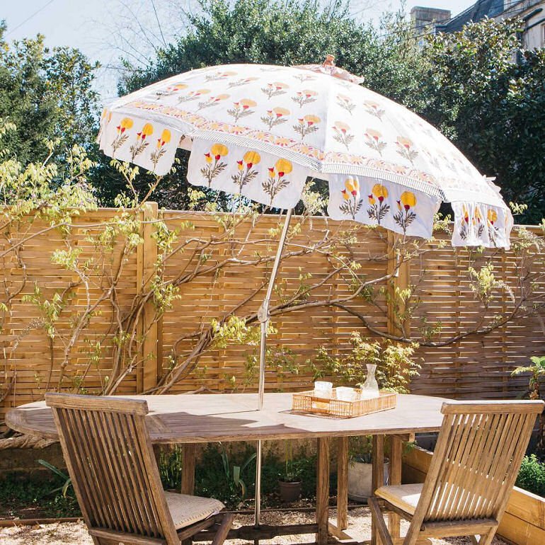 Graham & Green Marigold garden parasol with wooden garen table and chairs