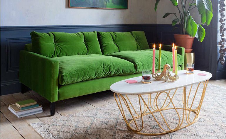 Graham & Green Kasper collection green velvet sofa with marble and brass oval coffee table