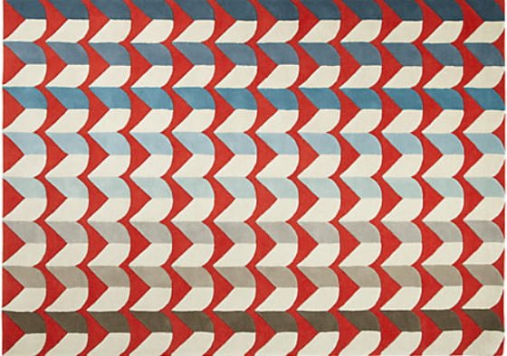 Colourful abstract wool rug in white, red, blue and brown