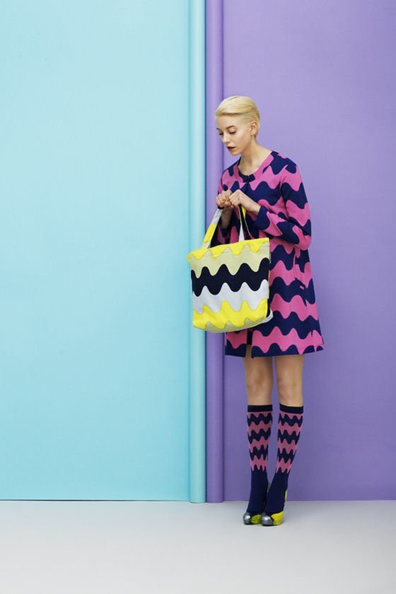 Pink and navy zig zag Marimekko dress against turquoise and lilac background