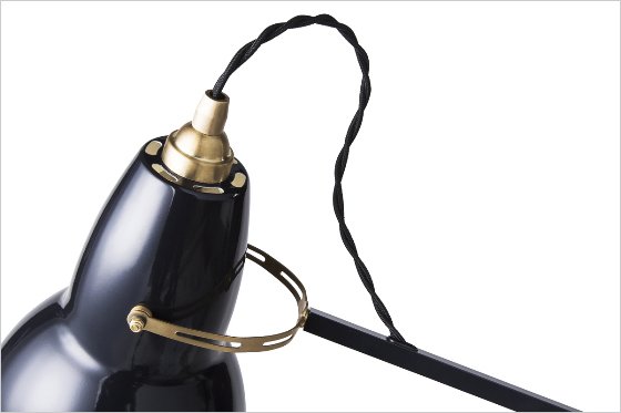 Detail of Anglepoise Original 1227 Brass Collection lamp showing woven cable and brass fittings