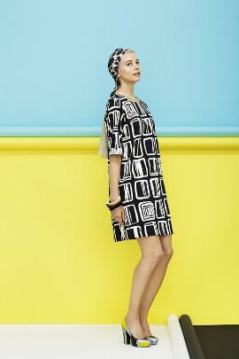Black and white Marimekko dress against turquoise and yellow