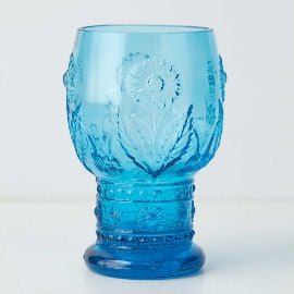 helianthus glass Blue drinking glass with sunflower moulded design from Anthropologie