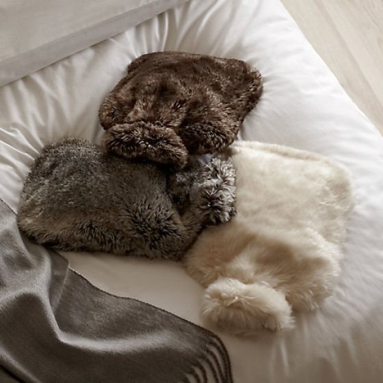Faux fur hot water bottle covers from John Lewis