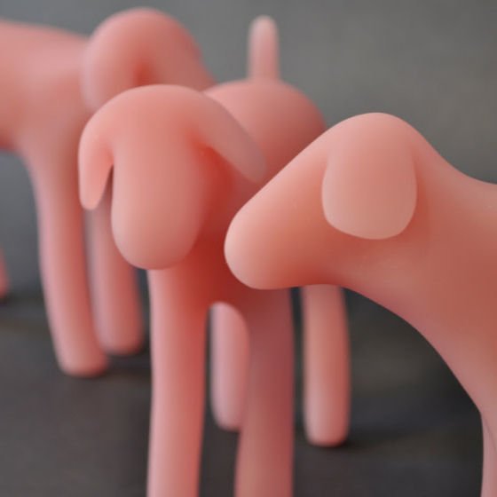 Woofy resin dog in pink