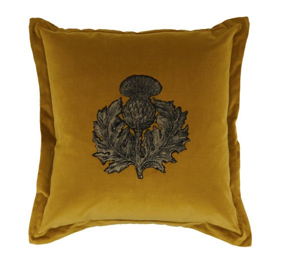 Gold velvet cushion with thistle illustration by Timorous Beasties