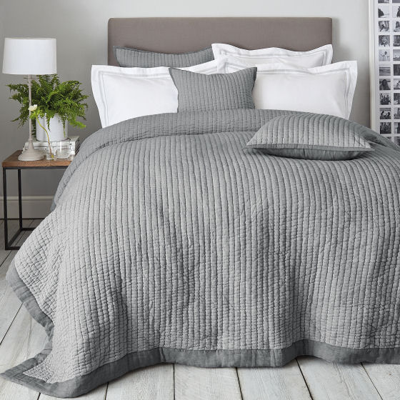 Hudson Quilt, contemporary pale grey cotton quilted bedspread with white bedding