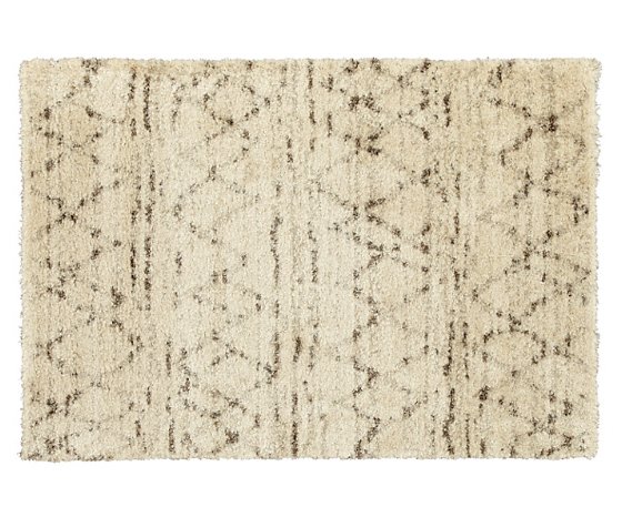 Berber style rug with grey diamonds on cream background