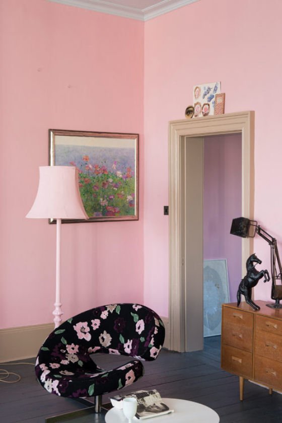 Nancy's Blushes Room with pink painted walls and black flowered chair