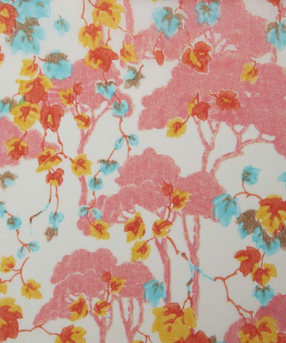 Liberty Tana Lawn design with white background, coral trees and yellow, orange and turquoise leaves