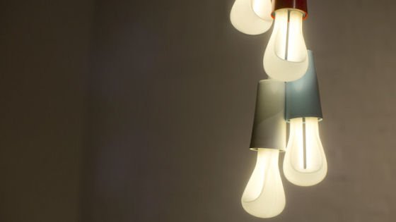 Bunched Plumen 002 bulbs Plumen 002 light bulbs hung in a bunch with coloured drop cap fittings
