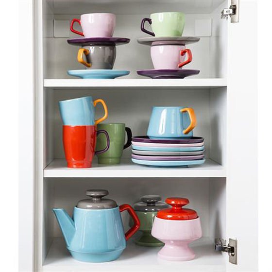 POP set Colourful table in open cupboard