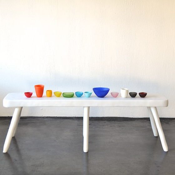 Colourful resin homewares on white resin bench by Tina Frey