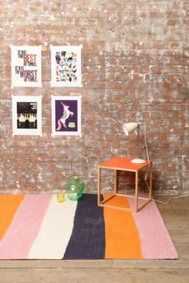 Striped Ashley Rug Grey, orange and pink striped Ashley rug with orange side table