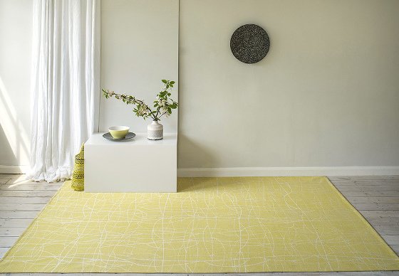 Helen Yardley yellow Chacha rug in modern room setting
