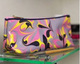 Cosmetic Bag made from marbled silk in lilac, pink, yellow and black