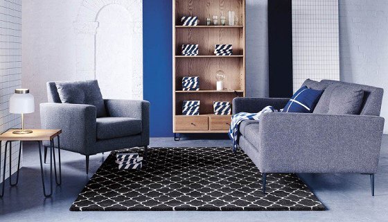 Heal's Brunel Sofa and Armchair in grey wool upholstery in living room setting