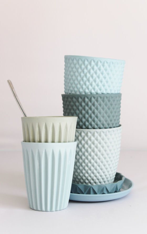 Stars and Stripes and Squares cups Geometric patterned ceramic cups by Dutch ceramic artist Lenneke Wispelwey in shades of blue