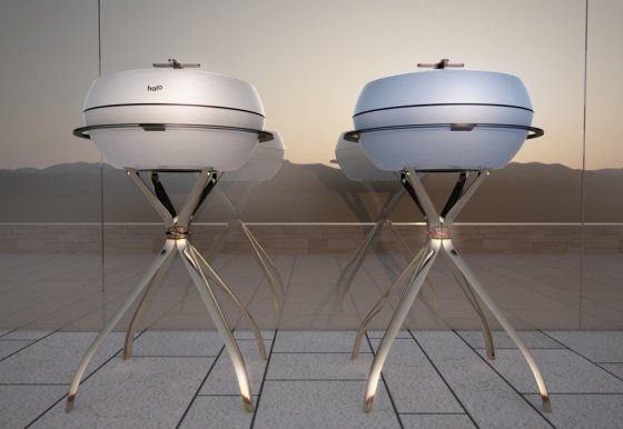 Two Halo Cooltouch Barbeques by window at sunset