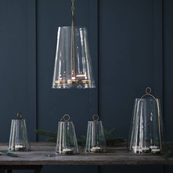 Outdoor lighting ideas: contemporary hanging glass lanterns with brass fittings