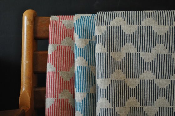 Hoof linen furnishing fabrics hanging over back of chair